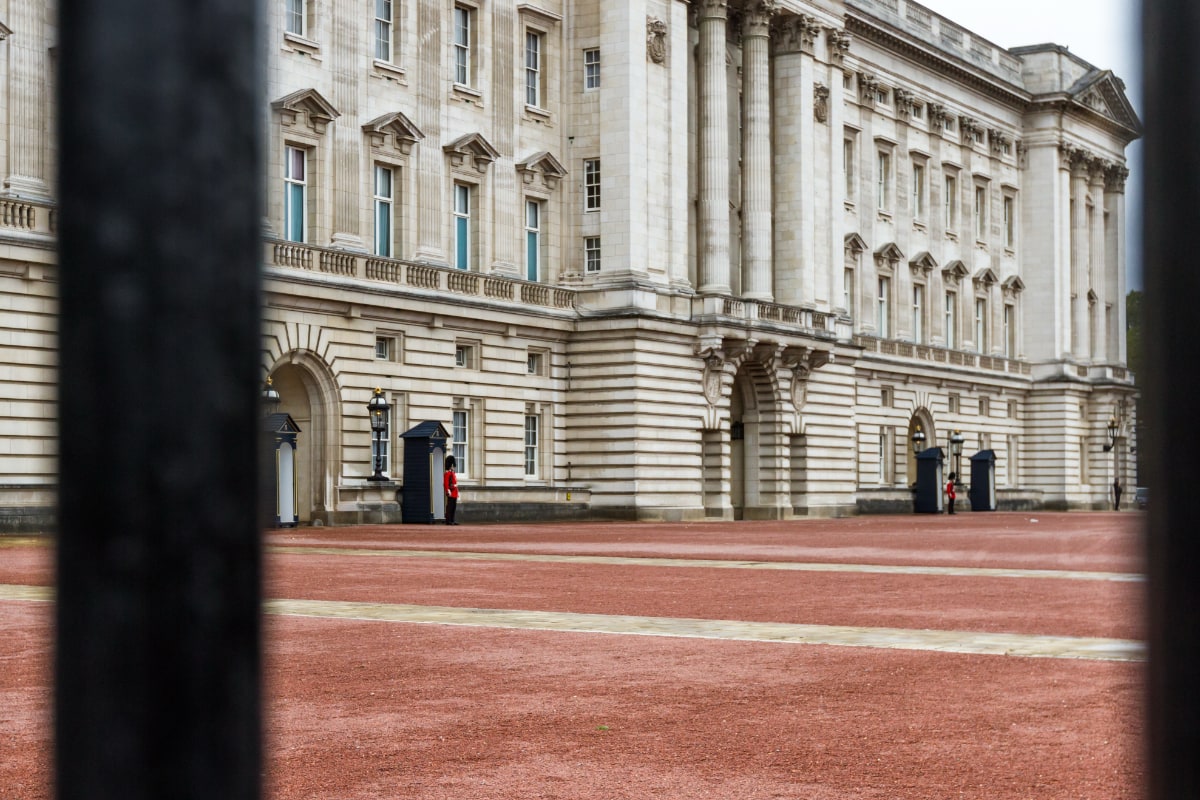 Buckingham Palace main gate at golden hour